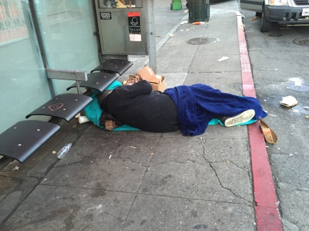 Homeless Man Sleeping On Street